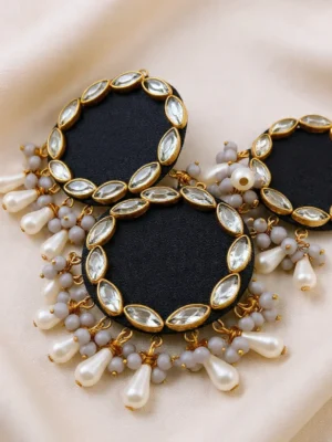 New Arrivals black round kundan button