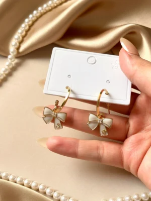 New Arrivals white bow hoops